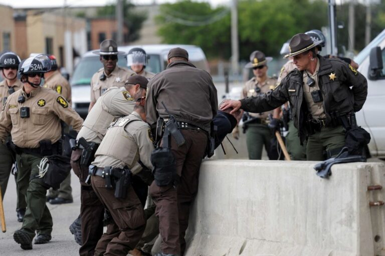 cook-county-sheriff-s-police-officers-detain-a-man-outside-the-u-s-immigration-and-customs-enforcement-ice-broadview-facilit